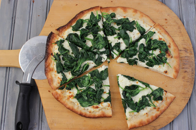 white pizza with spinach