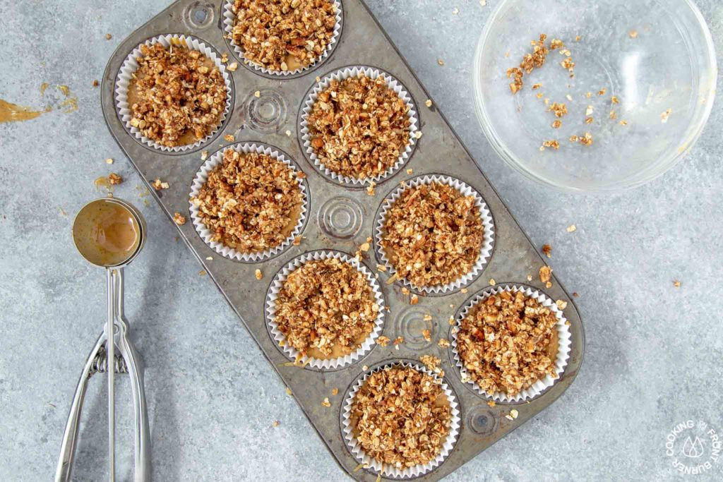 muffins with streusel topping ready to bake