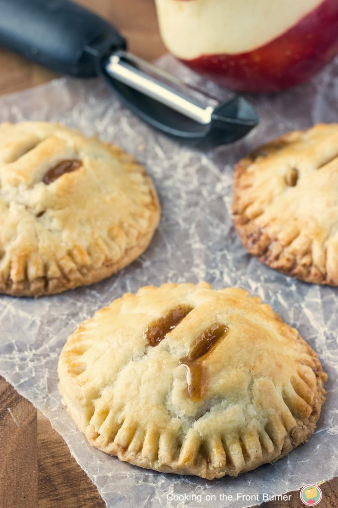 Apple Hand Pies are handheld versions of classic apple pie. Easy to make, this is the perfect snack or dessert recipe! | Cooking on the Front Burner