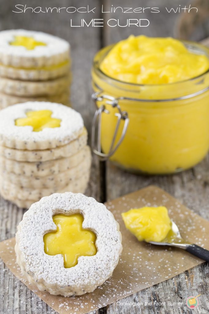 Light, delicate and buttery shortbread with the tang of homemade lime curd Shamrock Linzer Tarts with Lime Curd
