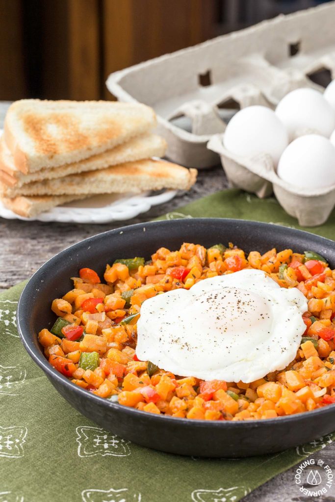 A great way to start your day with this easy Sweet Potato Hash skillet breakfast! Sweet Potato Hash with egg in a skillet