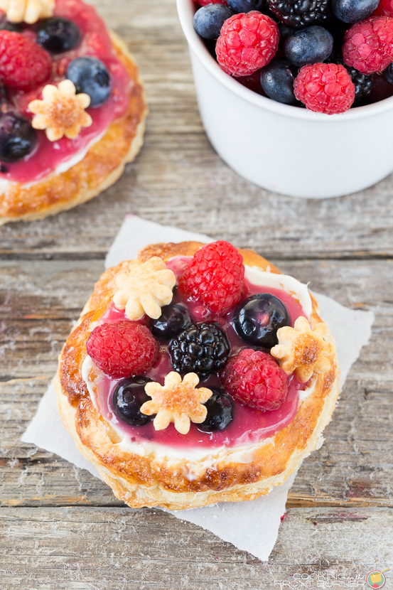 Mini fruit pizza on parchment paper