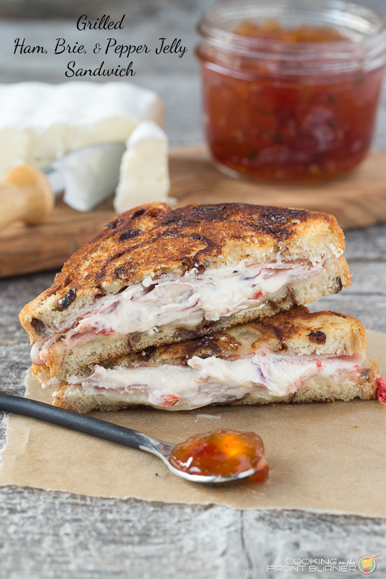 This gourment grilled ham sandwich made with cinnamon raisin bread and stuffed with cream cheese, pepper jelly and brie will knock your socks off! Lunch will go from OK to WOW! Grilled Ham, Brie, Pepper Jelly Sandwich | Cooking on the Front Burner