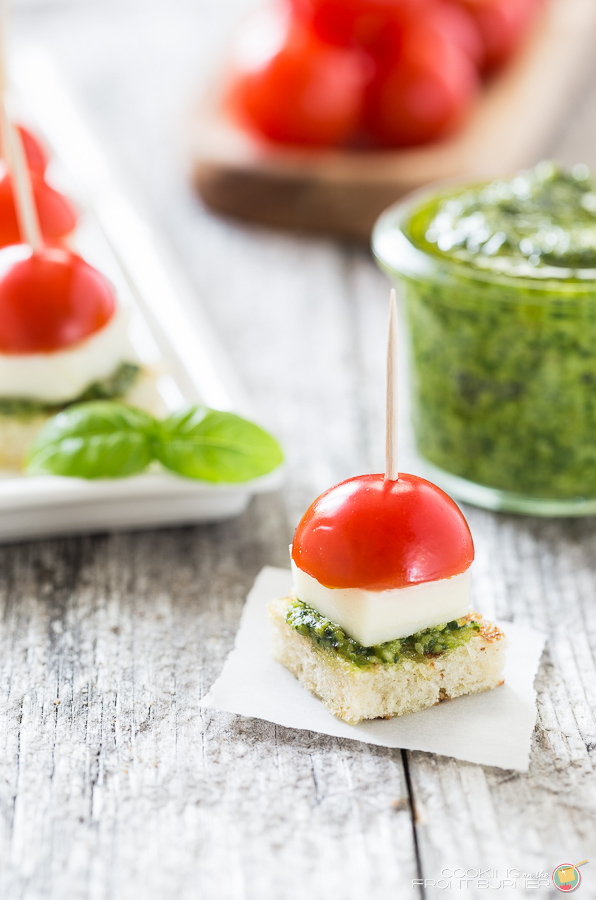 Enjoy these mini sized Caprese Bites with Pesto at your next party. Extra special by making your own pesto! Caprese Bites with Pesto | Cooking on the Front Burner