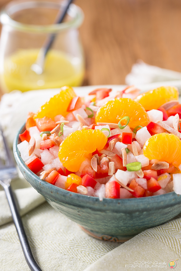 This light and refreshing jiacma salad is perfect for those hot summer days. Fresh ingredients and a tasty Asian Vinaigrette Jicama Salad with Asian Vinaigrette | Cooking on the Front Burner