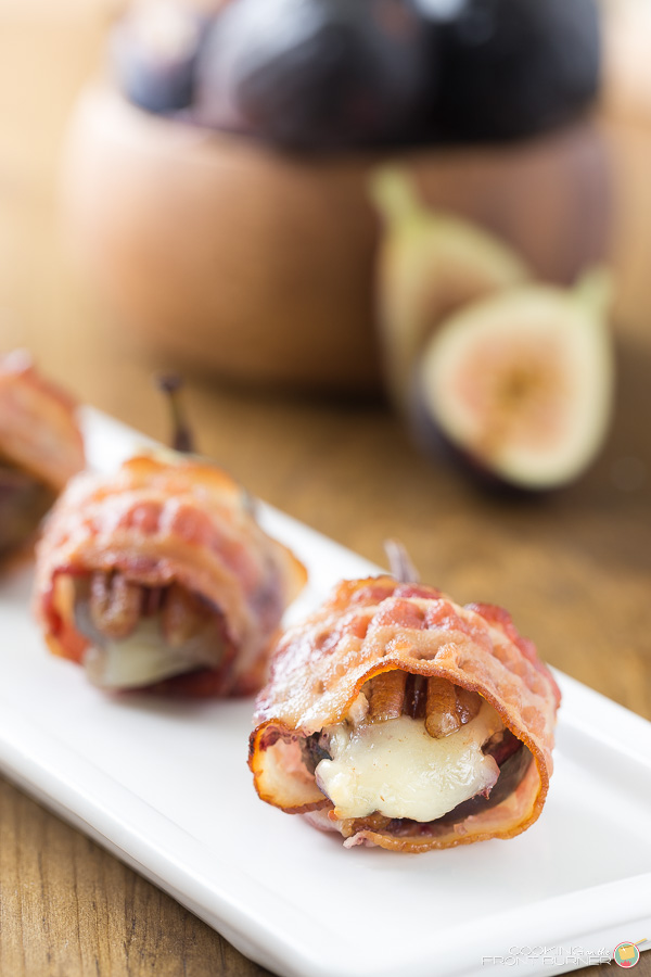 An easy and impressive appetizer - Fresh Figs steamed in bourbon, wrapped in bacon with gorgonzola and pecans. So good! Bacon Wrapped Fig Appetizers
