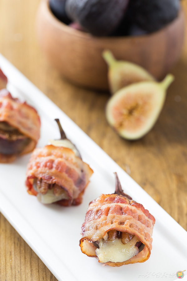 An easy and impressive appetizer recipe - Fresh Figs steamed in bourbon, wrapped in bacon with gorgonzola and pecans. So good! Bacon Wrapped Fig Appetizers