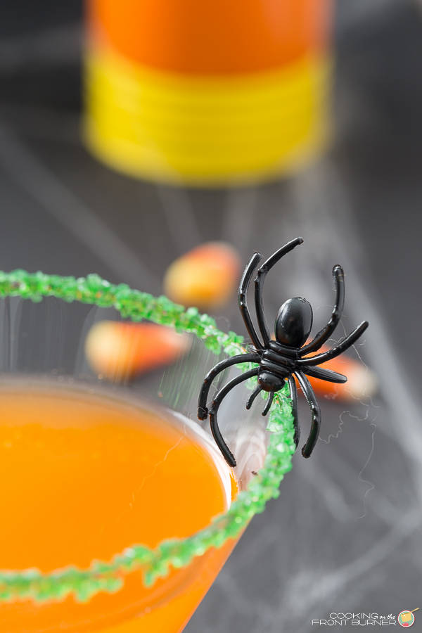 Happy Halloween with this adult candy corn infused martini! It's a treat and no trick! Candy Corn Martini | Cooking on the Front Burner