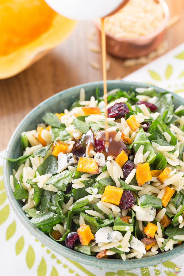 You will love this fall lighter salad with roasted butternut squash, spinach, orzo, craisins and gorgonzola cheese topped with a creamy maple vinaigrette.