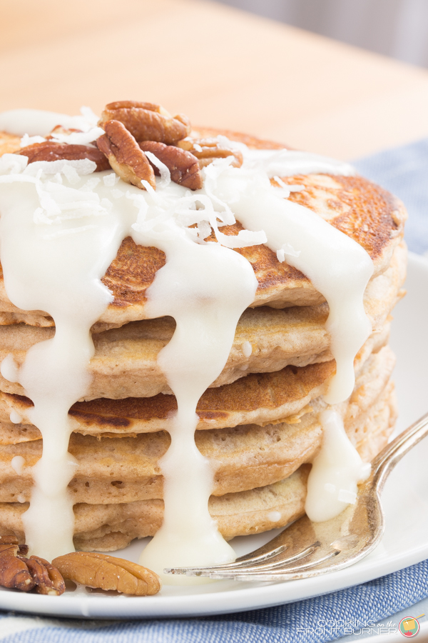 Cinnamon roll pancakes are a sweet treat in the morning! This easy pancake recipe is perfect for a weekend brunch! These pancakes will disappear before your eyes, and the glaze is to die for!
