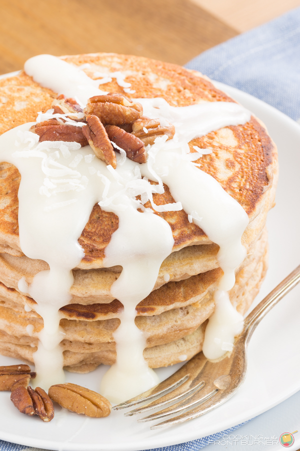 Cinnamon roll pancakes are a sweet treat in the morning! This easy pancake recipe is perfect for a weekend brunch! These pancakes will disappear before your eyes, and the glaze is to die for!