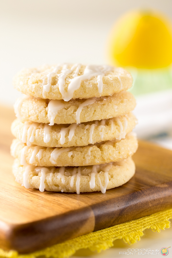 Lemon lovers will fall in love with these Glazed Lemon Crinkle Cookies! So easy to make too! Lemon Glazed Cookie | Cooking on the Front Burner