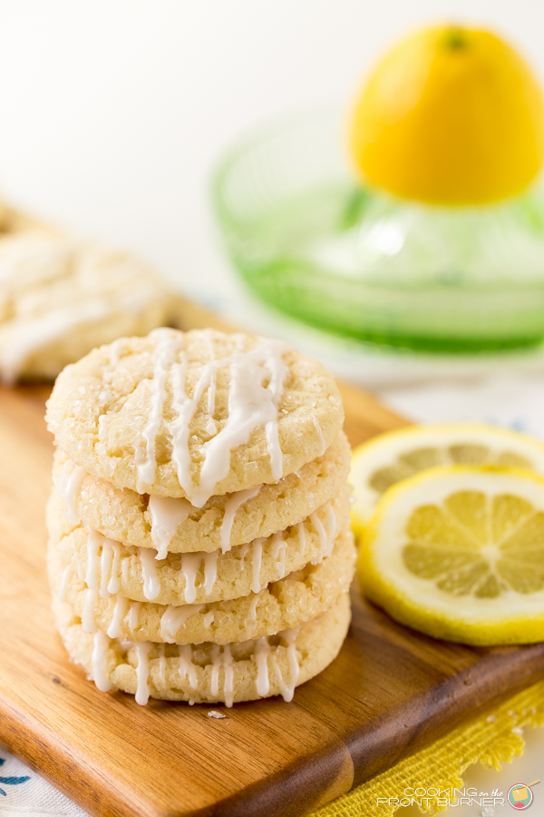 Lemon lovers will fall in love with these Glazed Lemon Crinkle Cookies! So easy to make too! Lemon Glazed Cookies | Cooking on the Front Burner