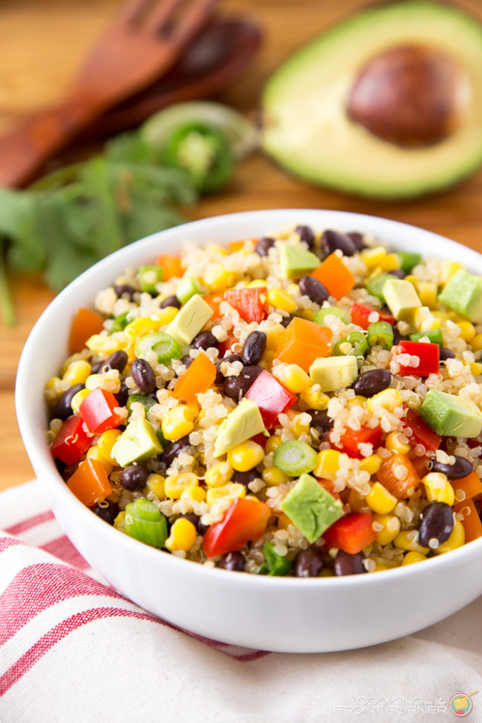 This Mexican Quinoa salad is full of fresh ingredients and has a zippy jalapeno vinaigrette! Perfect for a side or main dish. Mexican Quinoa Salad | Cooking on the Front Burner