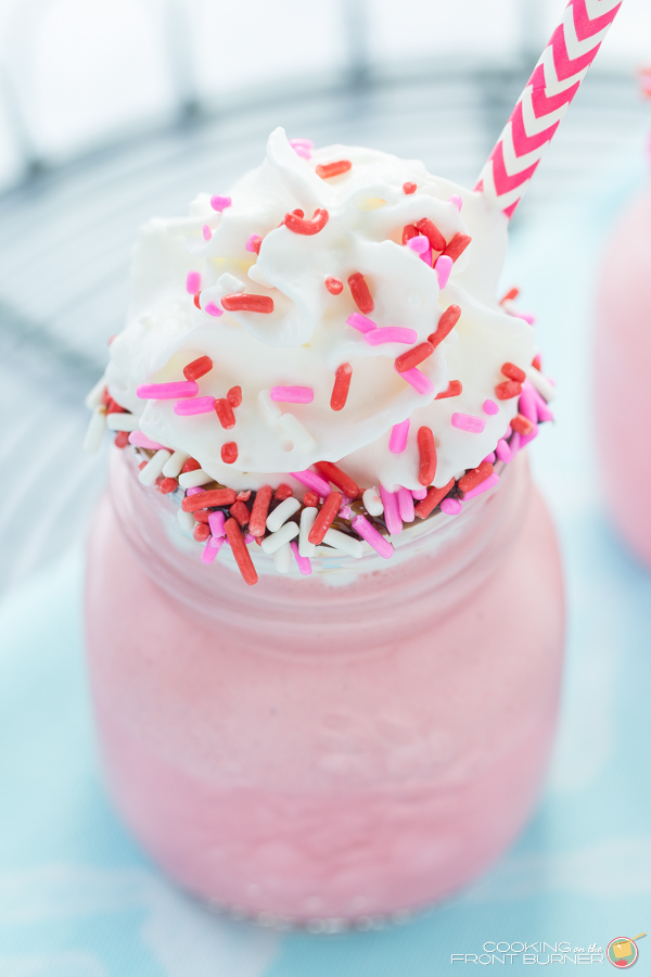 This Red Velvet Milkshake is cool, creamy and tasty! Kids and adults alike can enjoy this treat together! Red Velvet Milkshake | Cooking on the Front Burner
