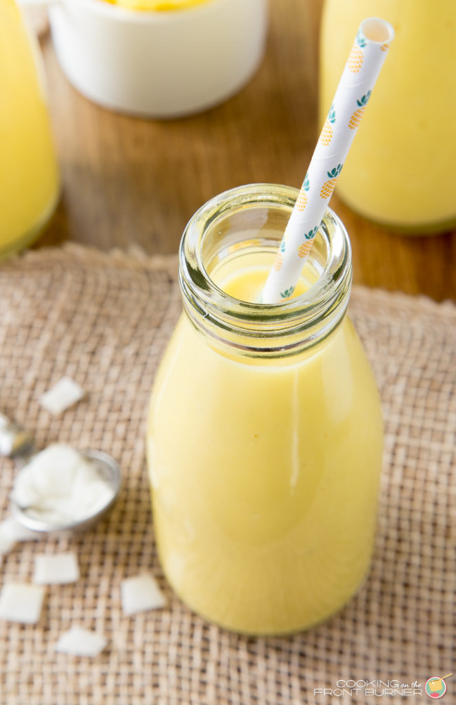 Pineapple Coconut Mango Smoothie photo One sip of a pineapple coconut mango smoothie, with its tropical fruit flavors, will help you feel like you've been whisked away to a tropical island resort! This easy smoothie recipe is so refreshing!