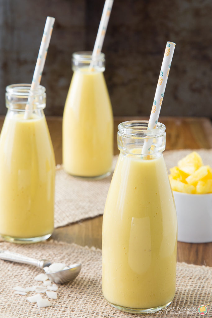 One sip of a pineapple coconut mango smoothie, with its tropical fruit flavors, will help you feel like you've been whisked away to a tropical island resort! This easy smoothie recipe is so refreshing!