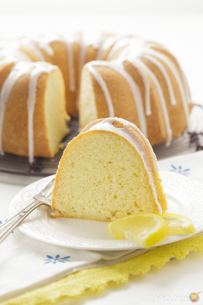 A moist and lemony pound cake that is bursting with flavor! Perfect for snacking! Lemon Pound Cake | Cooking on the Front Burner