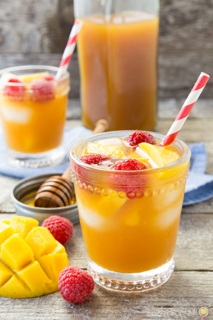 raspberry mango iced tea image You will love this easy refreshing Raspberry Mango Iced Tea recipe. Enjoy all summer long!