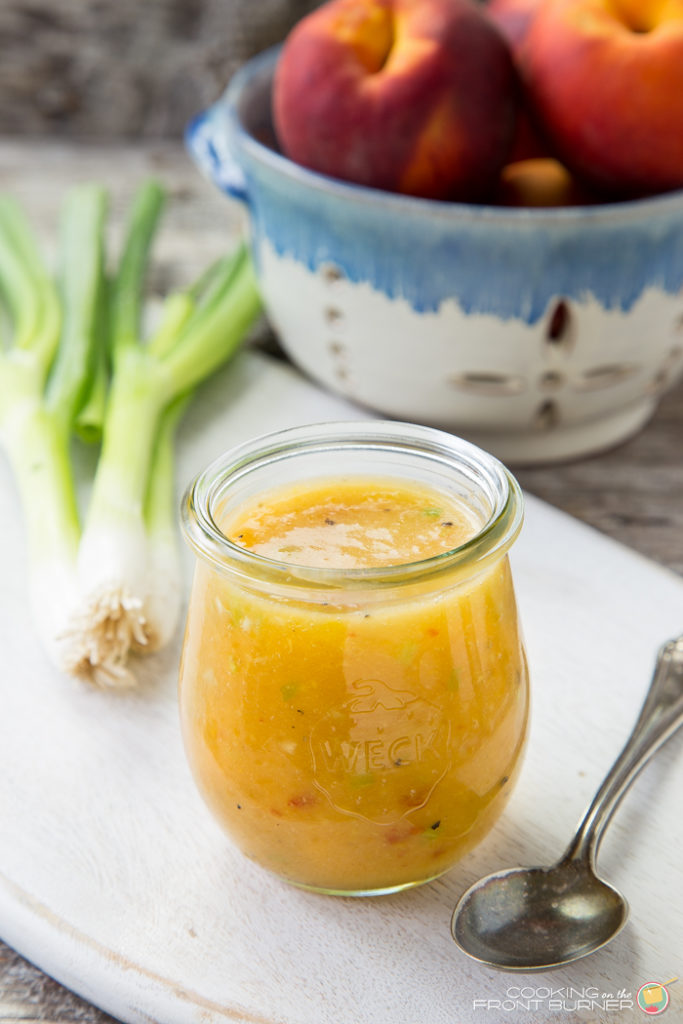It is so easy to make your own Peach Ginger Vinaigrette. Perfect on salads or a marinade! Easy Peach Ginger Vinaigrette | Cooking on the Front Burner