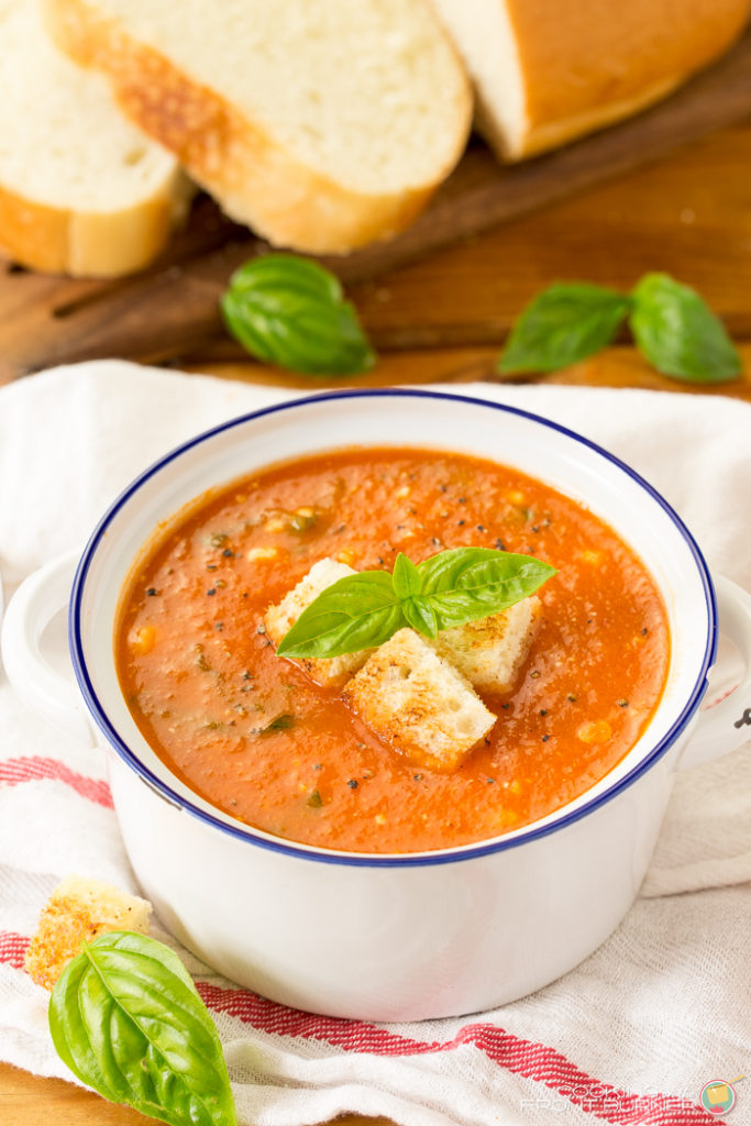 Fresh tomato basil soup is kicked up a notch with feta cheese. Easy to make, this easy homemade soup recipe makes delicious comfort food!!