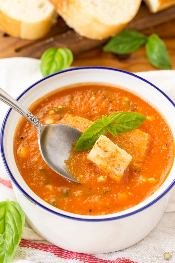 Fresh tomato basil soup is kicked up a notch with feta cheese. Easy to make, this easy homemade soup recipe makes delicious comfort food!!