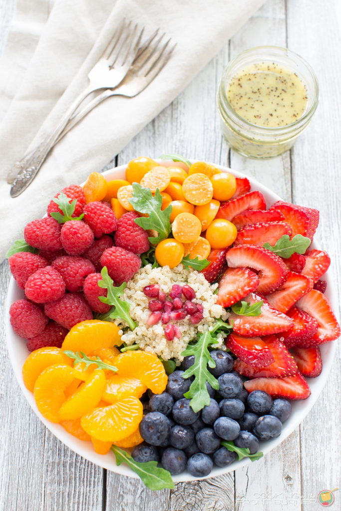 fruit arugula quinoa salad image Quinoa salad with fresh berries, arugula, and orange poppy seed vinaigrette makes the perfect healthy dinner! Recipe here!
