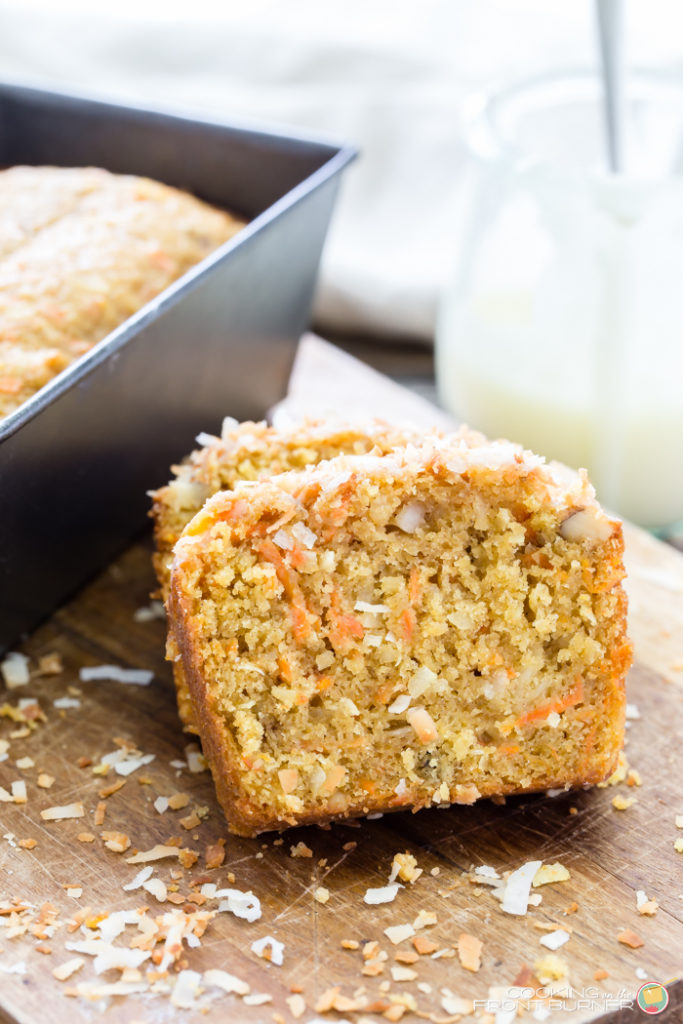 Carrot coconut bread - This super quick and easy Carrot Coconut bread is loaded with carrots, coconut, walnuts with a creamy glaze and topped with toasted coconut. Perfect for breakfast, Easter and when company calls!