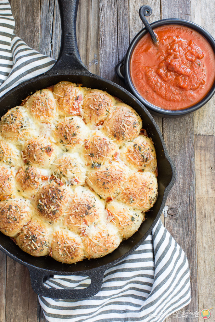 pull apart pizza rolls portrait Pull apart pizza rolls make the perfect snack or dinner option. They are little, light, fluffy pillows topped with Italian seasonings, cheese and pepperoni tucked in between.