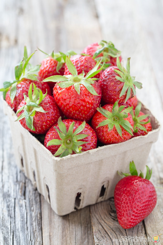 a basket of fresh strawberries in a berry basket