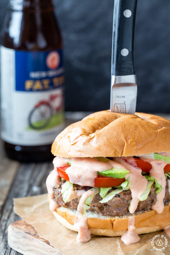 loaded taco burgers - hero Taco burgers loaded with your favorite Mexican flavors are the perfect Taco Tuesday grilling recipe. These are sure to be a hit this summer!