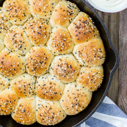 Make these easy everything seasoning pull apart rolls with a creamy cream cheese dipping sauce. It's like your favorite bagel but much easier to make at home!