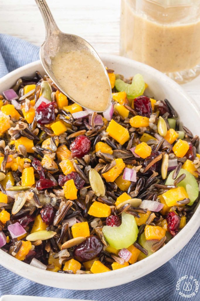 This Butternut Squash and Wild Rice Salad starts with roasted squash and Minnesota wild rice then tossed with crunchy celery, sweet dried cranberries, pumpkins seeds and drizzled with a maple walnut vinaigrette.  Perfect for fall, holidays or any time!