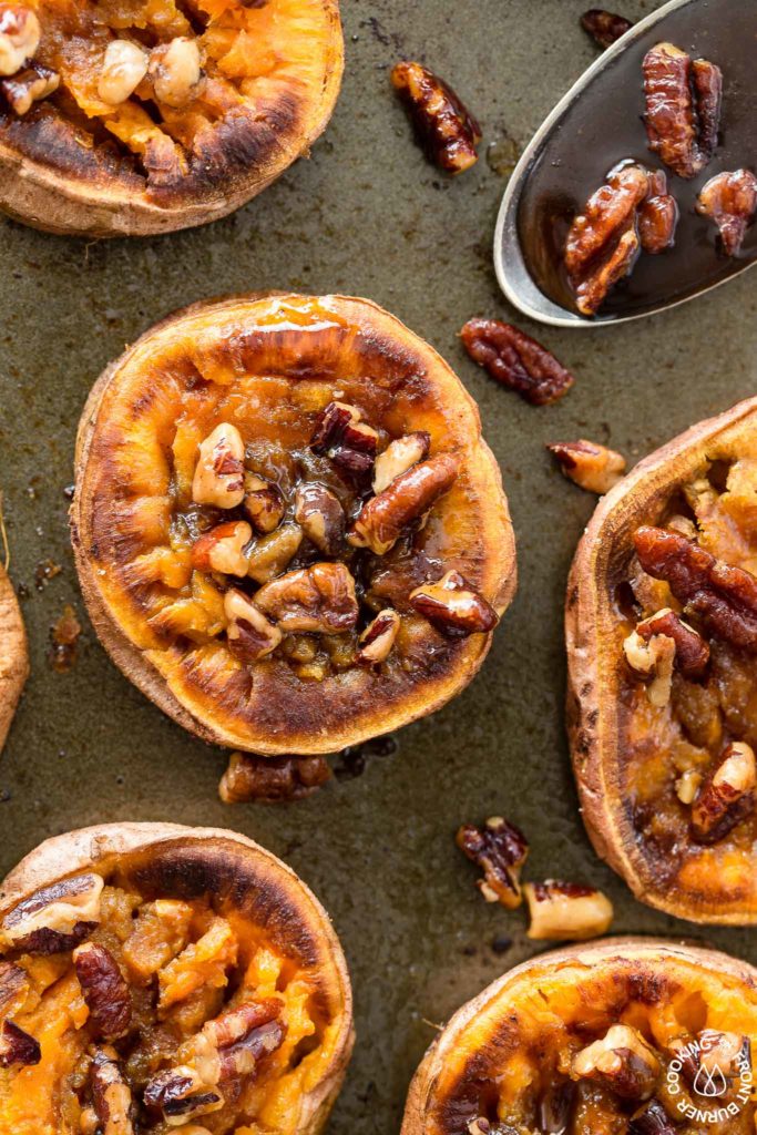 These Smashed Sweet Potatoes are the perfect side dish for any occasion.  The sweet potatoes are roasted with cinnamon, a bit of chili powder and topped with toasted maple pecans!