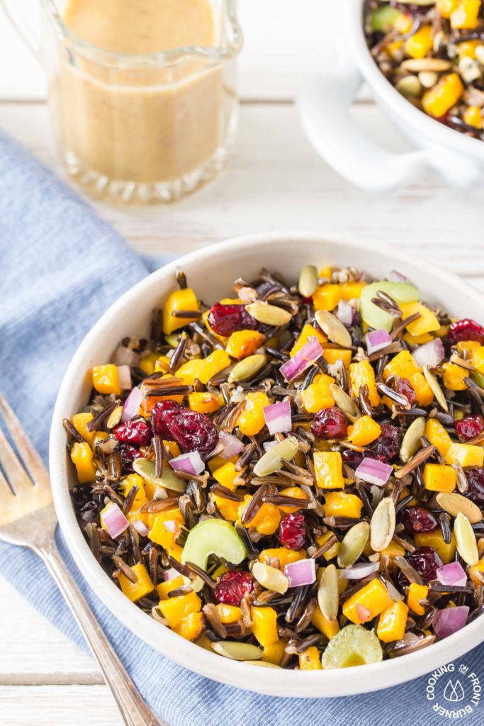 This Butternut Squash and Wild Rice Salad starts with roasted squash and Minnesota wild rice then tossed with crunchy celery, sweet dried cranberries, pumpkins seeds and drizzled with a maple walnut vinaigrette.  Perfect for fall, holidays or any time!