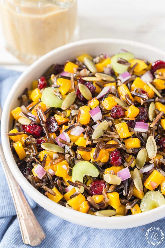 This Butternut Squash and Wild Rice Salad starts with roasted squash and Minnesota wild rice then tossed with crunchy celery, sweet dried cranberries, pumpkins seeds and drizzled with a maple walnut vinaigrette.  Perfect for fall, holidays or any time!