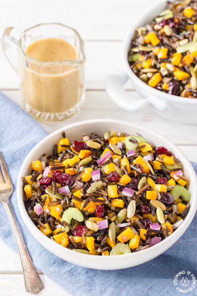 This Butternut Squash and Wild Rice Salad starts with roasted squash and Minnesota wild rice then tossed with crunchy celery, sweet dried cranberries, pumpkins seeds and drizzled with a maple walnut vinaigrette.  Perfect for fall, holidays or any time!