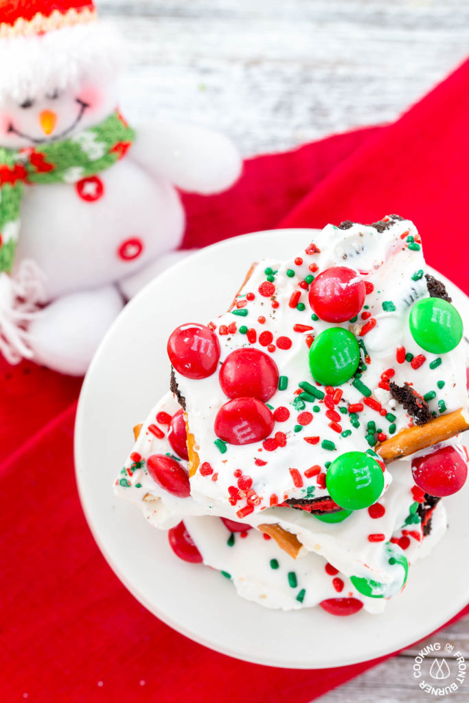  This Easy Christmas Bark Recipe is loaded with sweet and salty ingredients for a perfect combo! Makes a great snack or gift for the holidays!