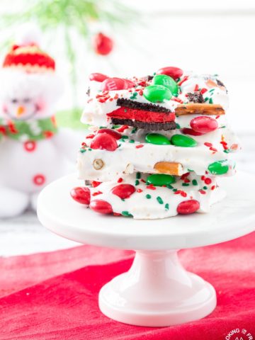 Need a last minute gift or a fun snack for yourself?  If so, you will want to keep this Easy Christmas Bark Recipe on hand.  It is loaded with sweet and salty ingredients for a perfect combo!