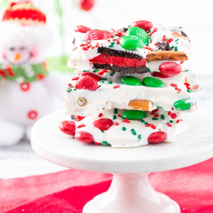 Need a last minute gift or a fun snack for yourself?  If so, you will want to keep this Easy Christmas Bark Recipe on hand.  It is loaded with sweet and salty ingredients for a perfect combo!