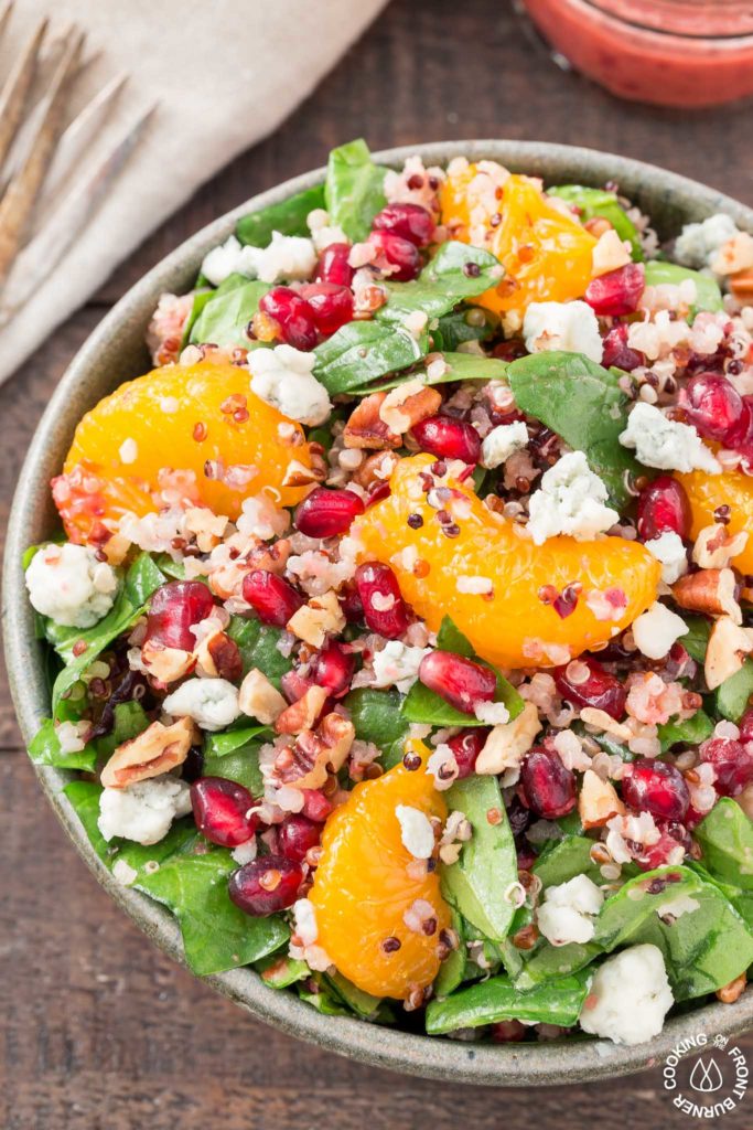 This Chopped Spinach Winter Salad is a healthy, flavorful side dish. You will especially love the freshly made cranberry and orange vinaigrette!