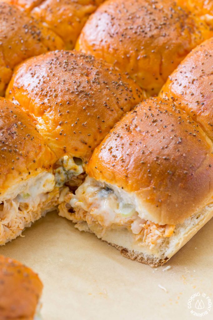 Your game day will be kicked up a notch with these Easy Buffalo Chicken Sliders!  The perfect party size sandwich with the right amount of spice, creamy blue cheese and some crunchy celery.