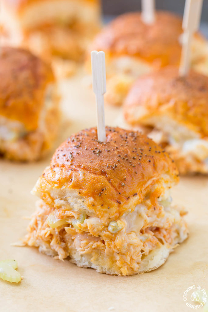 Your game day will be kicked up a notch with these Easy Buffalo Chicken Sliders!  The perfect party size sandwich with the right amount of spice, creamy blue cheese and some crunchy celery.