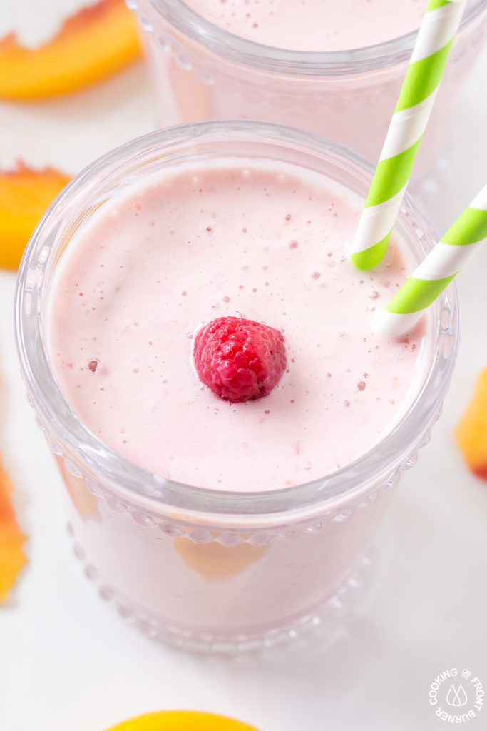 Making this Healthy Peach Raspberry Smoothie is easy to prepare and makes a delicious breakfast beverage or snack. It is so simple with frozen raspberries and peaches with yogurt, soy milk and a touch of honey.