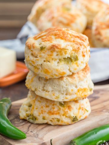 These Green Chile Cheddar Biscuits are perfect with a bowl of your favorite soup or chili.  They are light, fluffy and kicked up a notch with green chilies.  Eating them plain too is a good idea!