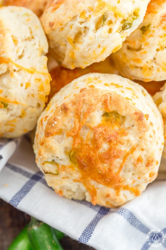 These Green Chile Cheddar Biscuits are perfect with a bowl of your favorite soup or chili.  They are light, fluffy and kicked up a notch with green chilies.  Eating them by themselves is a good snack idea too!