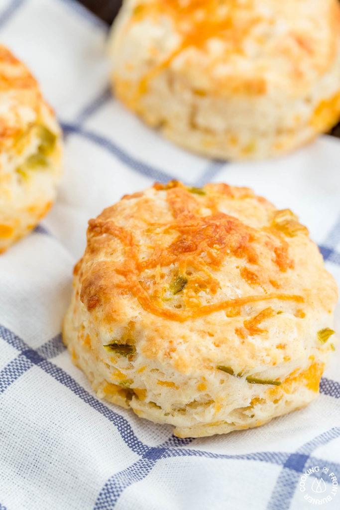 These Green Chile Cheddar Biscuits are perfect with a bowl of your favorite soup or chili.  They are light, fluffy and kicked up a notch with green chilies.  Eating them by themselves is a good snack idea too!
