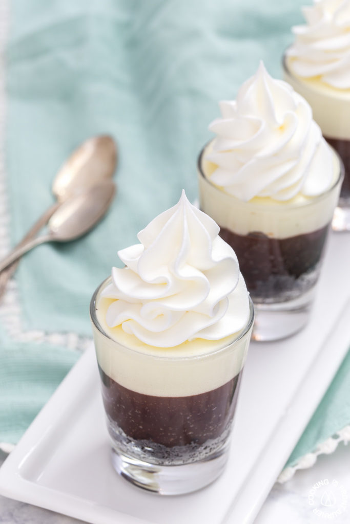 These no-bake Double Chocolate Mousse Shooters make the perfect mini dessert.  They have an chocolate crumb crust, a dark chocolate truffle layer then topped with a creamy white chocolate mousse.  You can even have more than one, I'll never tell!