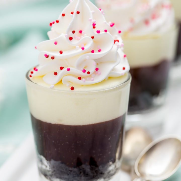 These no-bake Double Chocolate Mousse Shooters make the perfect mini dessert.  They have an chocolate crumb crust, a dark chocolate truffle layer then topped with a creamy white chocolate mousse.  You can even have more than one, I'll never tell!