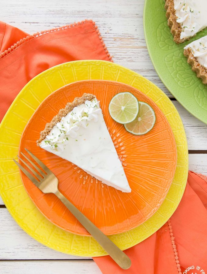 Light and refreshing describes this no-bake Frozen Margarita Tart. You will love the creamy whipped texture with fresh lime juice, lime zest, triple sec, tequila mixture all piled into a salty pretzel crust.